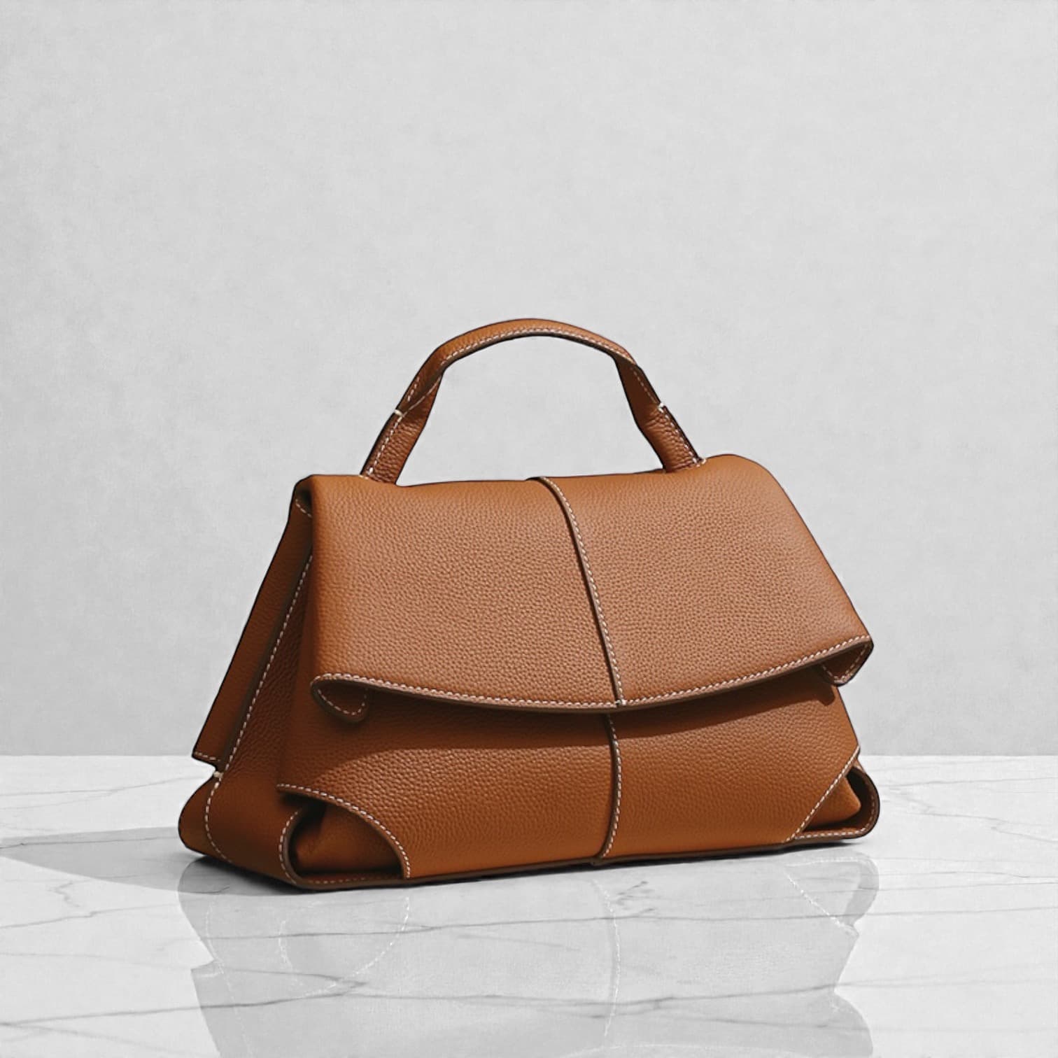 570牛革トップハンドルフラップバッグ