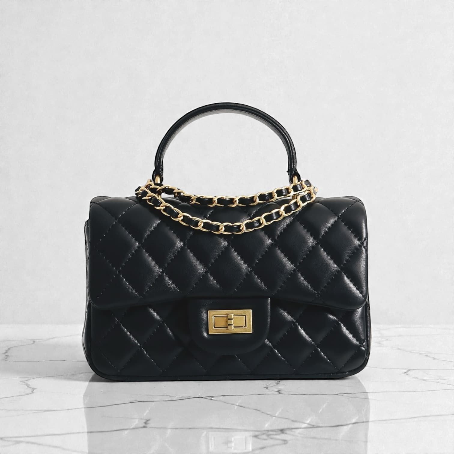 563 羊革TOPハンドルクラシカルバッグ BLACK｜艶キルティングで上品に　ルビリア