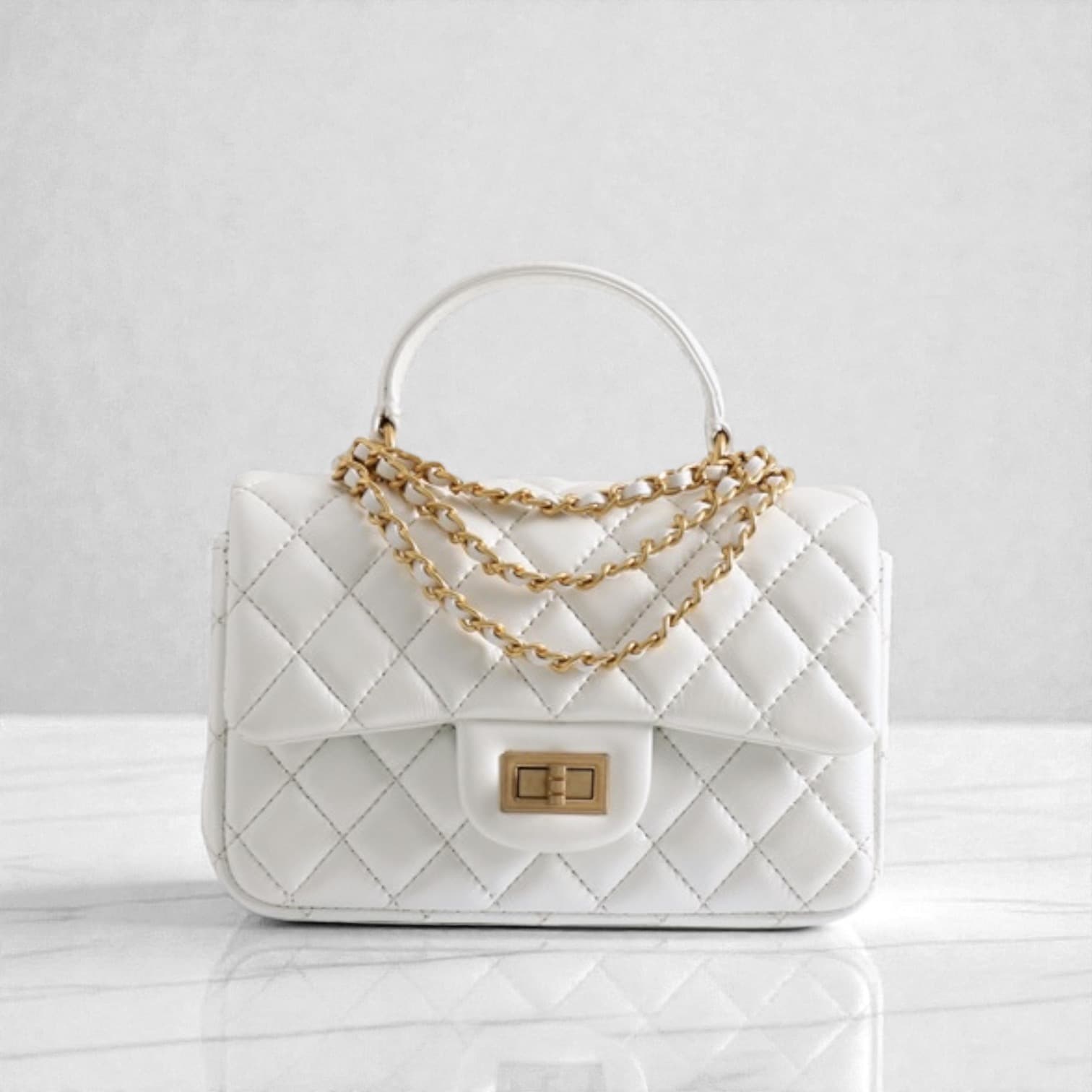 563 羊革TOPハンドルクラシカルバッグ WHITE｜艶キルティングで上品に　ルビリア