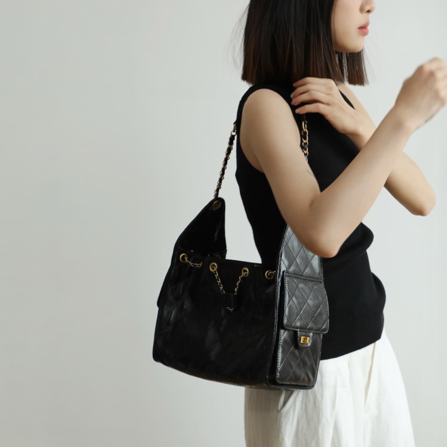 552 本革キルティング巾着バッグ BLACK｜艶キルティングで上品見え　ルビリア